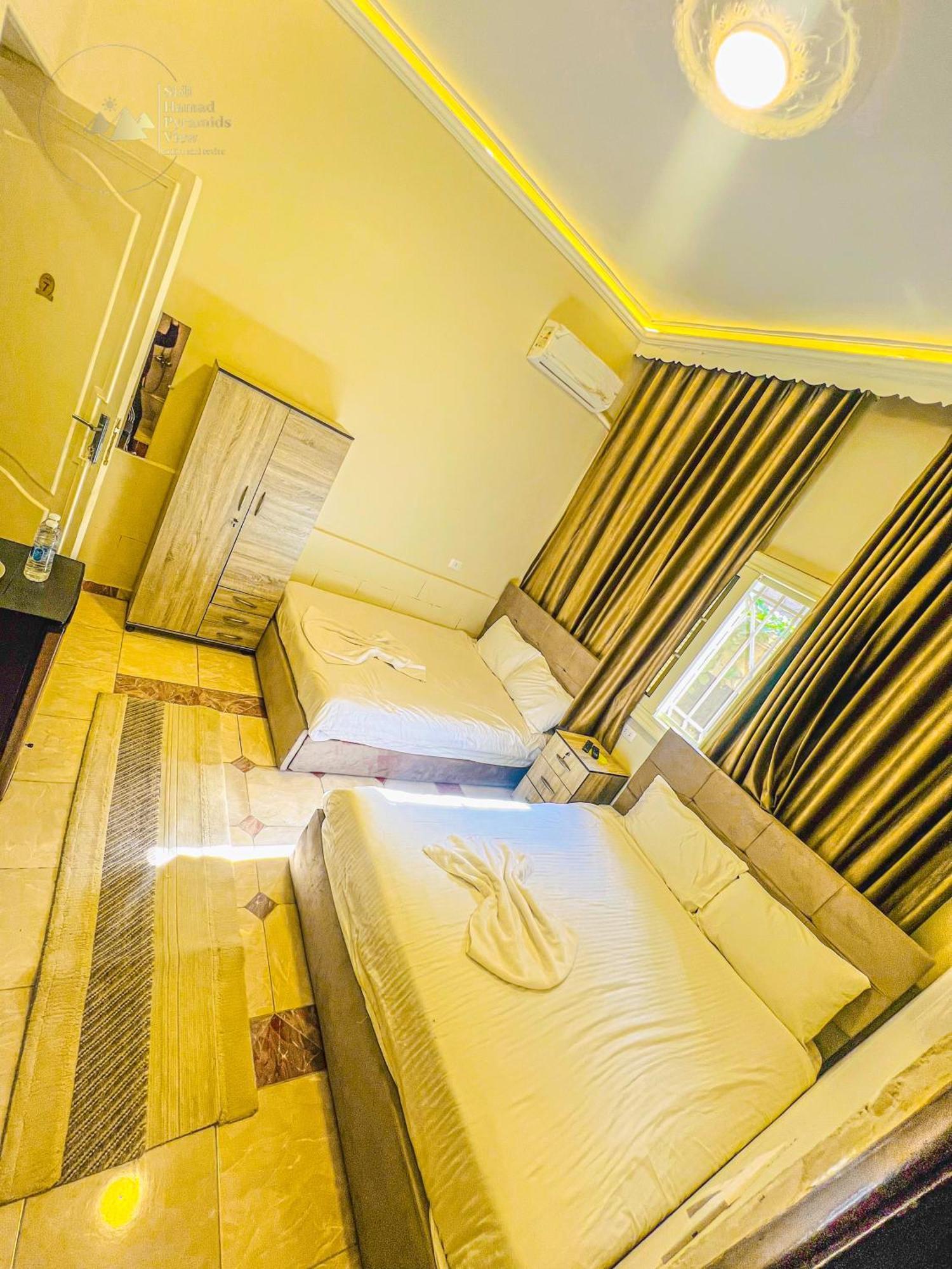 Sidi Hamad Pyramids View Hotel Kafret el-Gabal Exterior photo