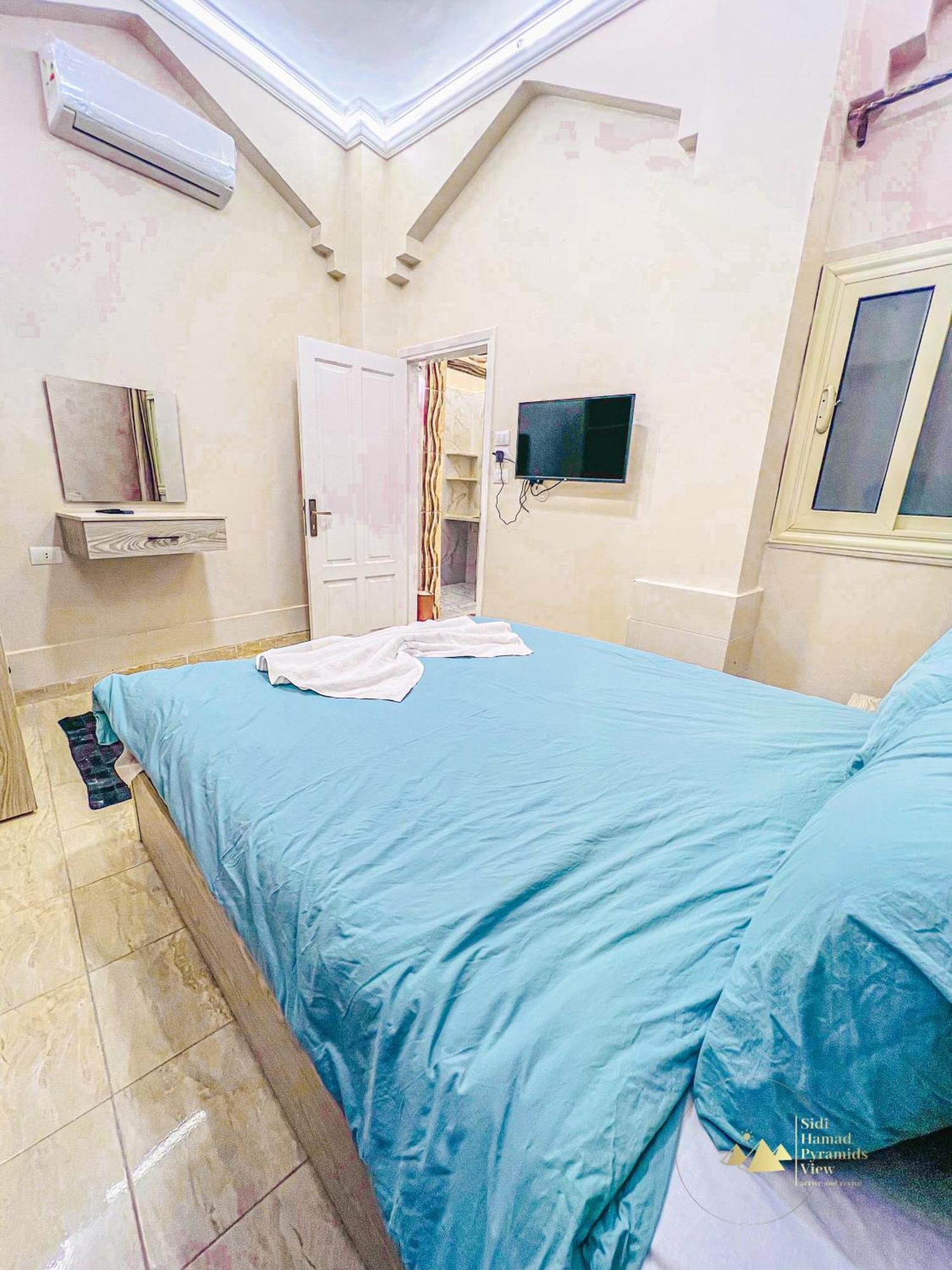 Sidi Hamad Pyramids View Hotel Kafret el-Gabal Exterior photo